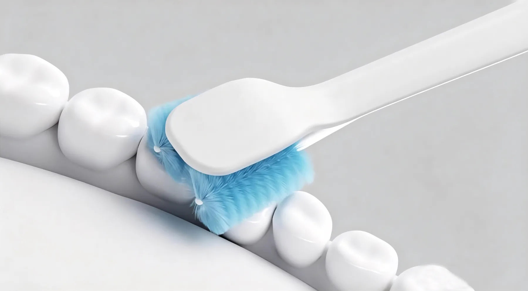 UniTooth brush head positioned against teeth